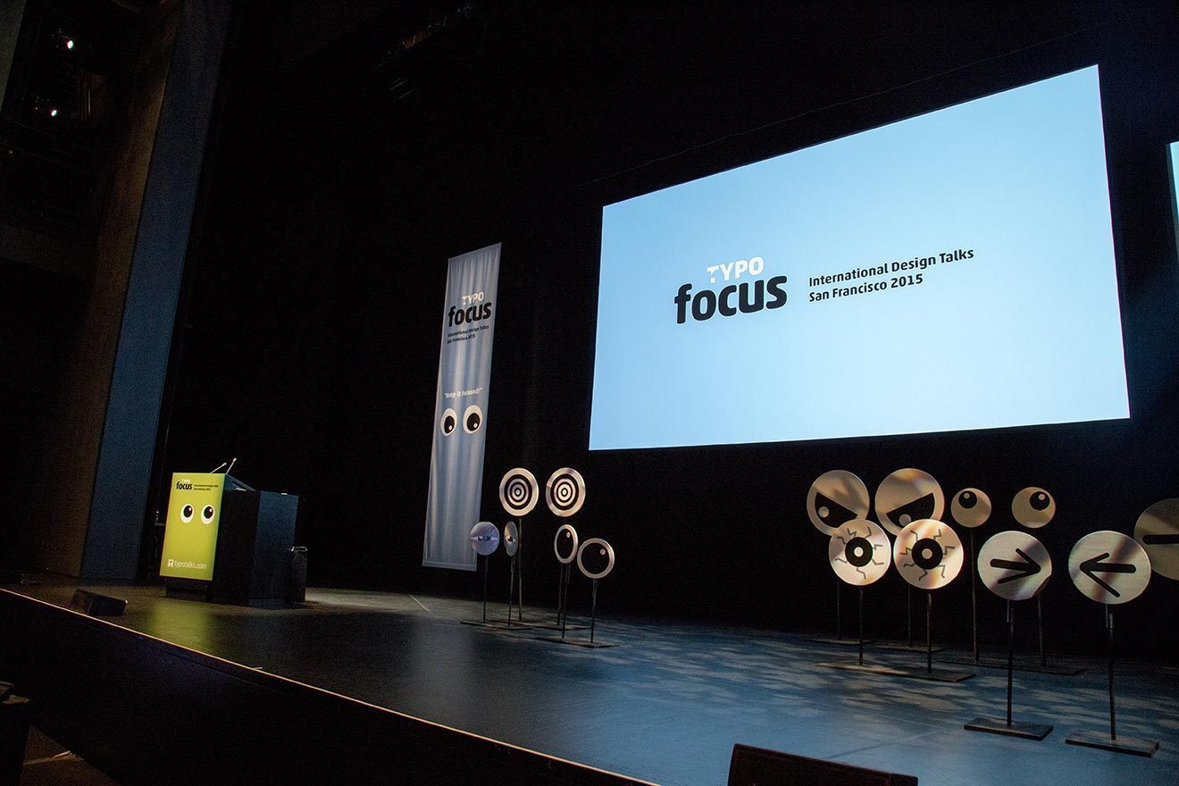 This year’s theme, Focus, came with several pairs of eyes marking the conference material, as well as some physical ones we used to dress the stage.