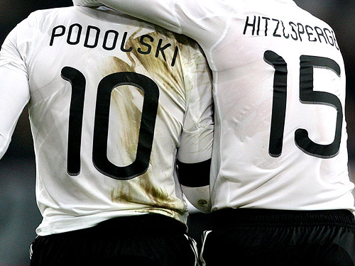 Unity numbers and players’ names on German shirts.